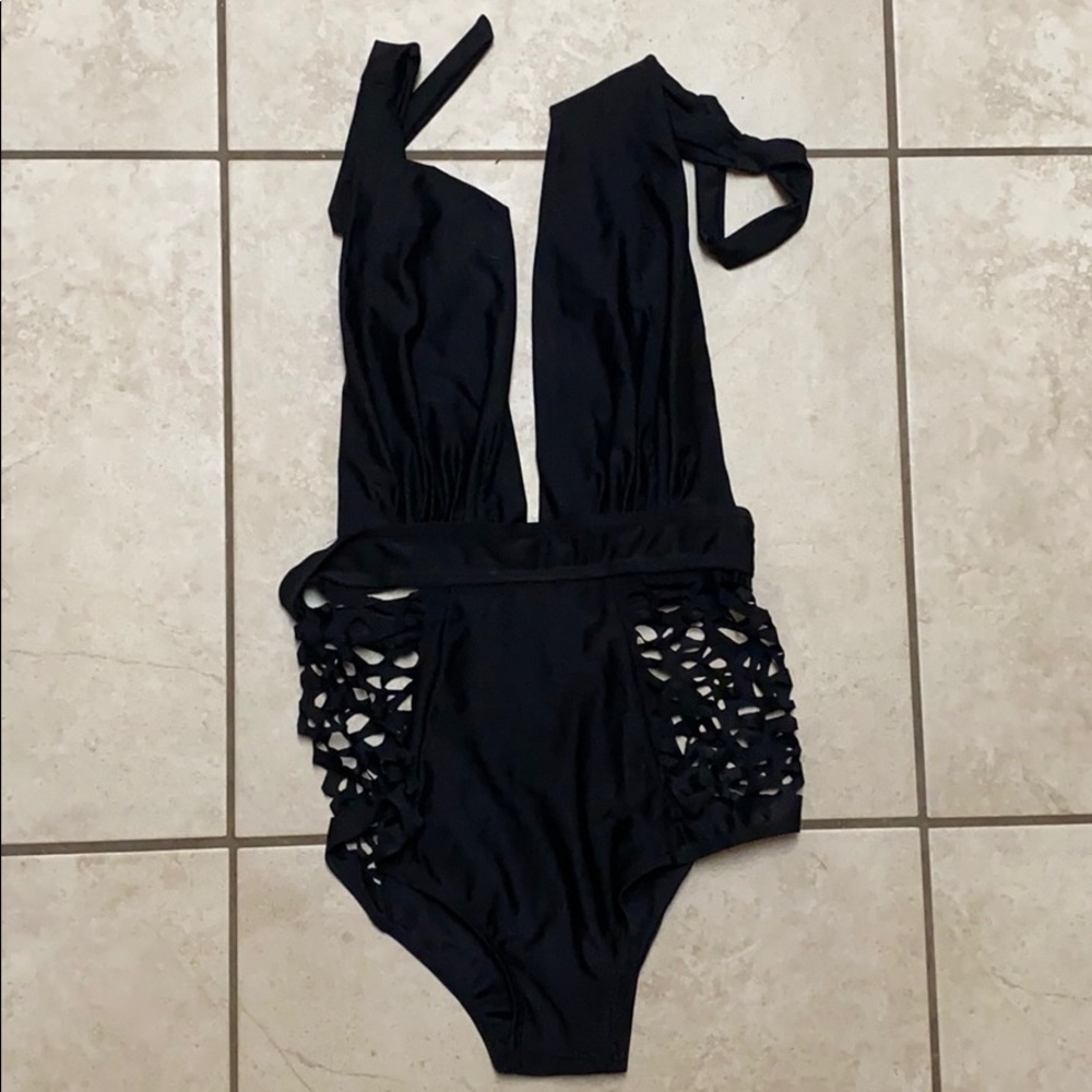 one piece with holes on sides